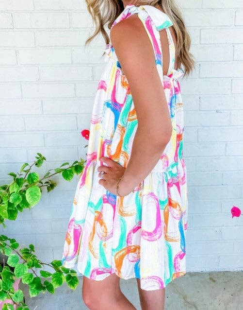 Crossed Arrows Clothing Wholesale co. - Abstract Print Knotted Straps Ruffled Mini Dress